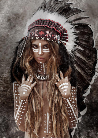 Person wearing a feathered headdress and face paint, featured on the "Fearless" poster for living room decor.