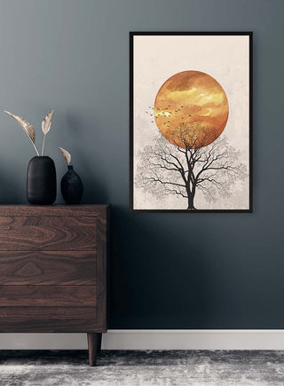 Framed "Meeting at Sunset" by Vincent V. featuring a tree silhouette against a vivid orange sunset on a modern wall.