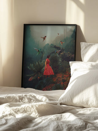 Framed "20 Seconds Before the Rain" by Frank Moth resting on a sunlit bed with white bedding.