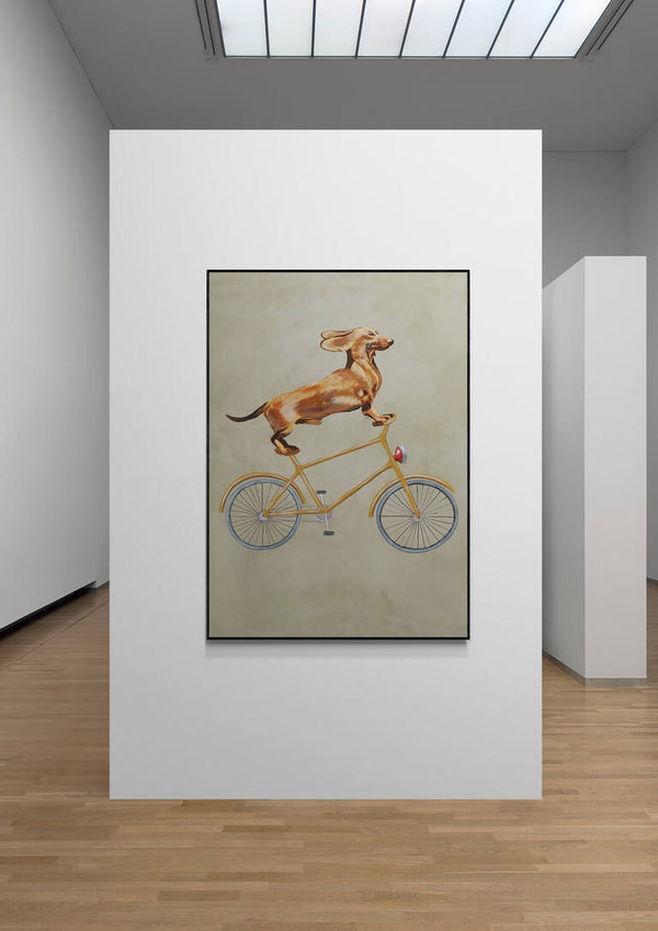 Perro salchicha en bicicleta - Coco de Paris
