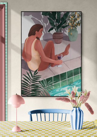 Framed art print of a woman in a yellow swimsuit lounging by a pool, available from I Bet You Think About Me - Goed Blauw.