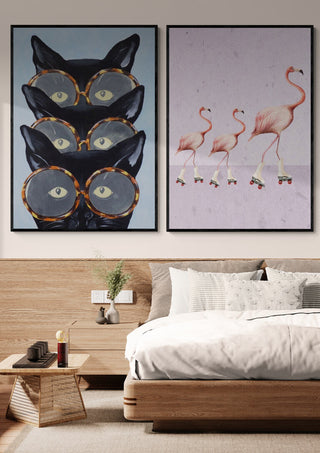 Art print of a flamingo family wearing rollerskates, displayed above a modern bed, by Coco de Paris.