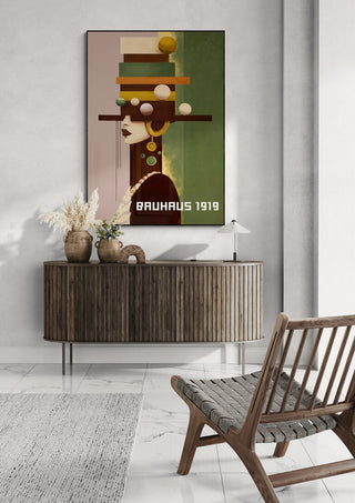 Framed "Bauhaus Woman 03" by David Wolf on wall above a wooden console in a modern living room.